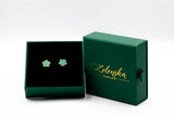 Turquoise flower earrings in a Zelenska Jewellery box on a white background