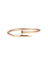 Rose gold bracelet on a white background