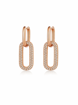 Rose gold hoop earrings with diamond accents on a white background